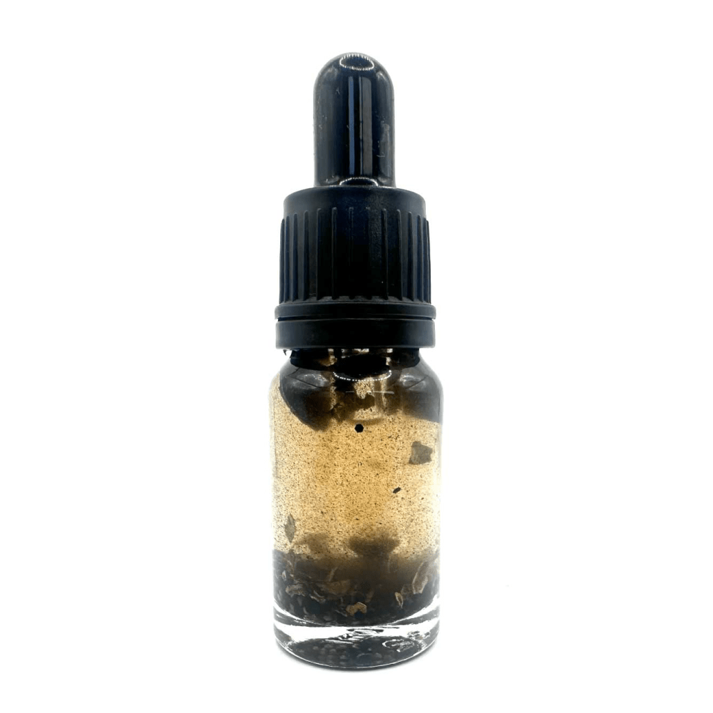 Bat’s Blood Oil in dropper bottle for black arts, hex-breaking, and banishing