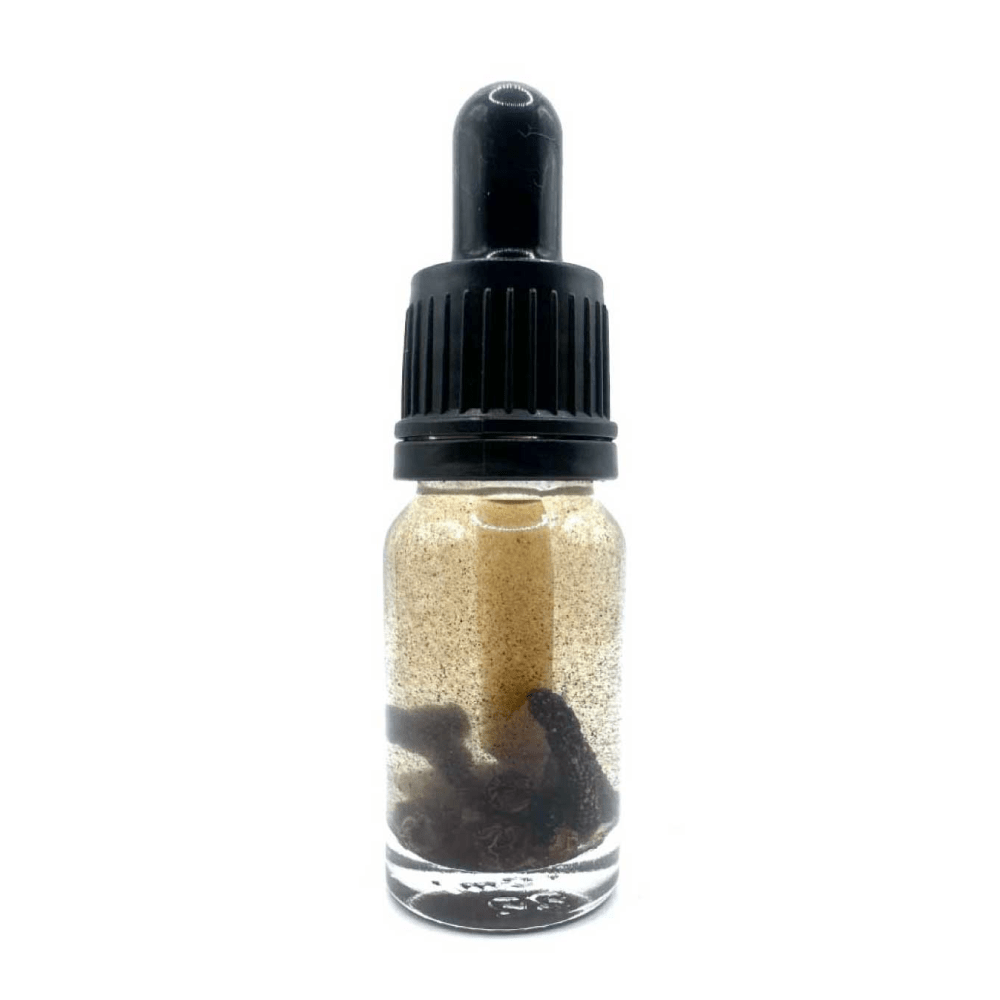 Black Pepper Oil in glass dropper bottle for protection and banishing spells