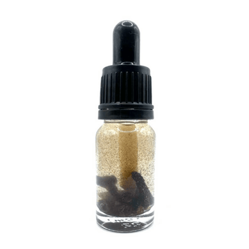 Black Pepper Oil in glass dropper bottle for protection and banishing spells