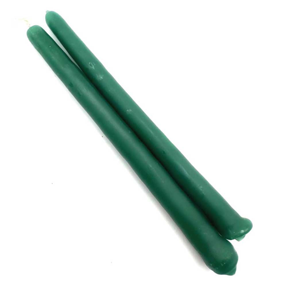 Dark green spell candle for prosperity, healing, and growth rituals